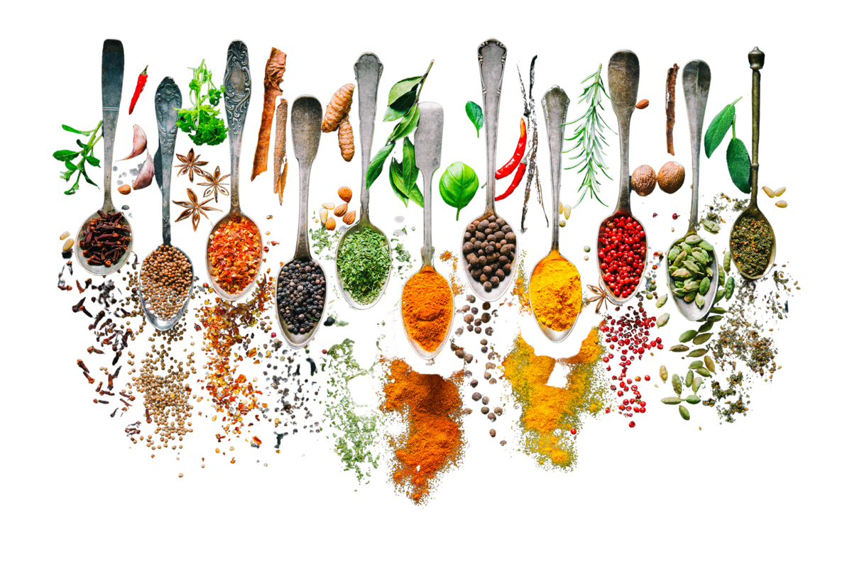Spoons of colorful Thai herbs and spices